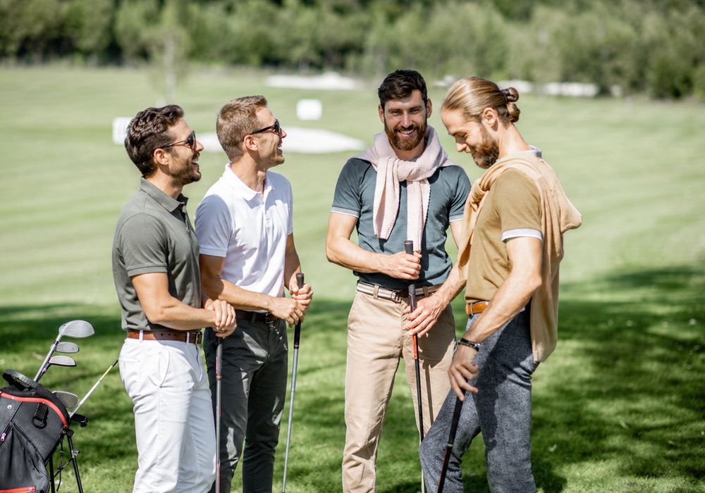Golf group of four men on the course in Austin.