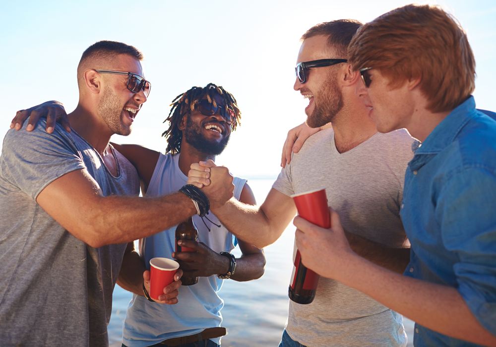 Bachelor party group on the beach in Los Angeles.