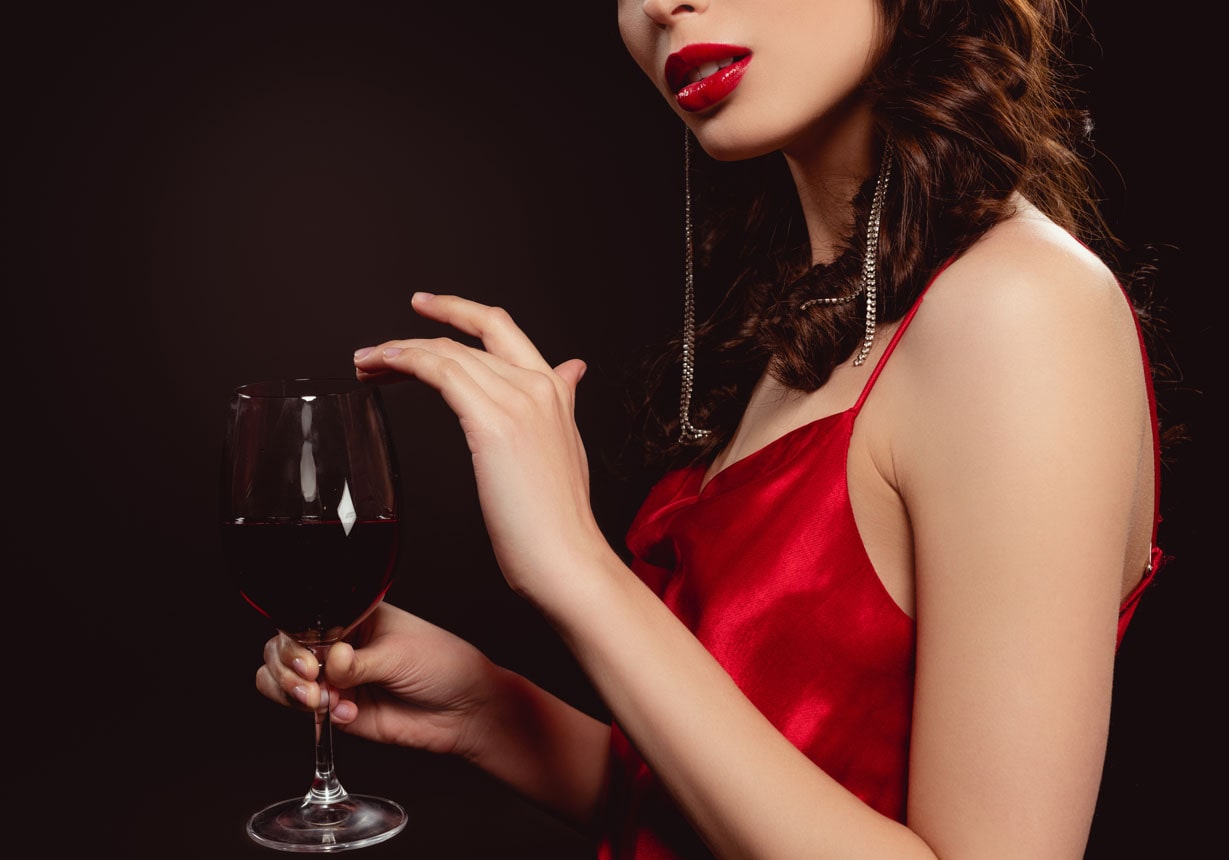 Elegant Woman with a Glass of Wine